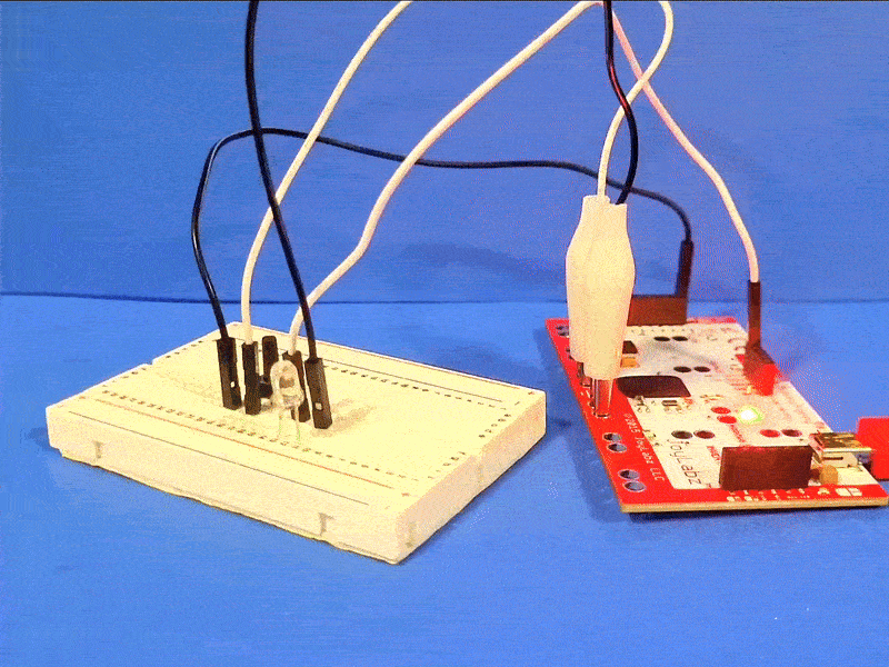 A video demo showcases the simple LED breadboard + MakeyMakey circuit in action. It functions by pressing a button to complete the circuit.