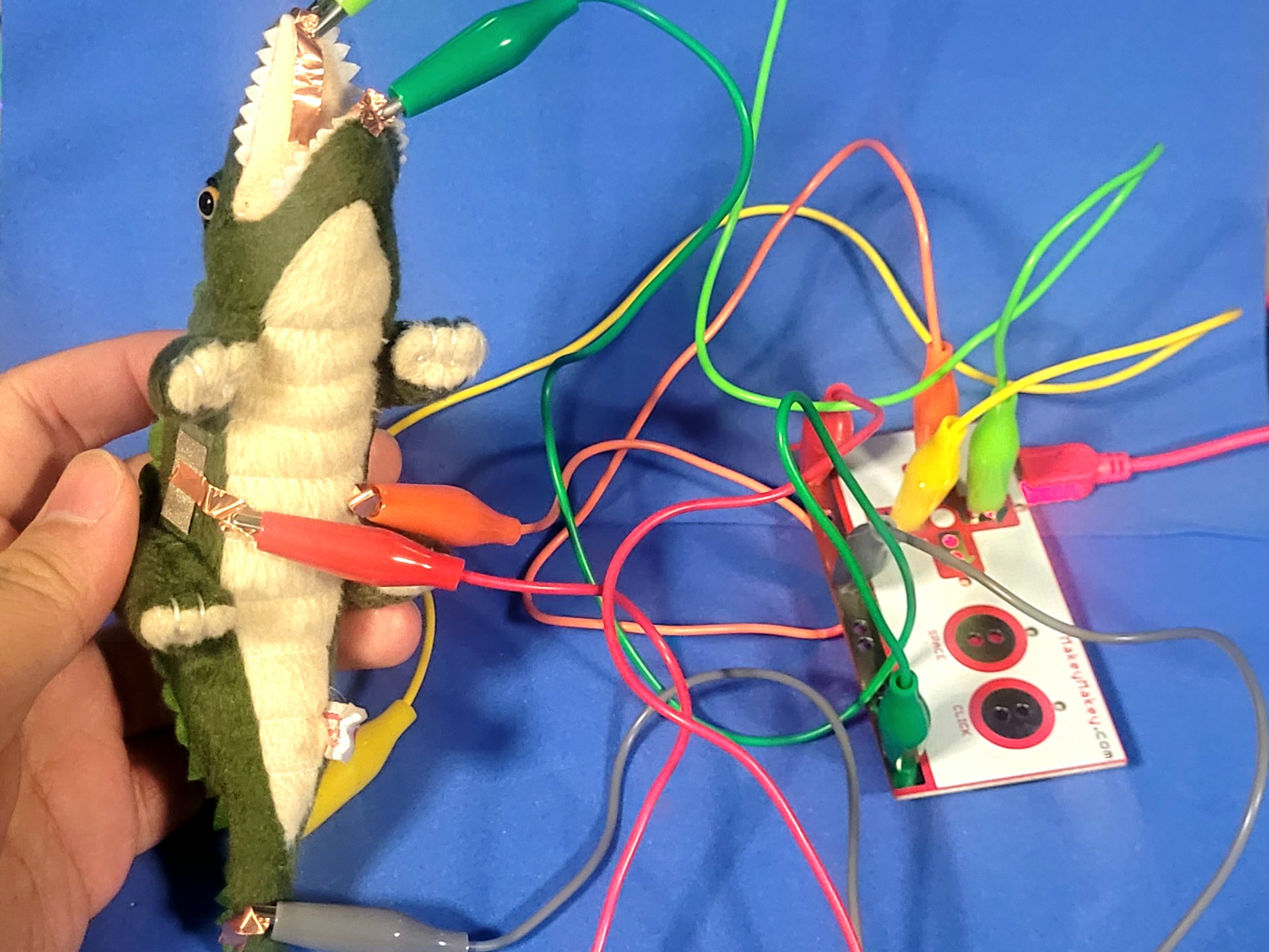 An iteration on the alligator circuit, now with two additional interactive portions. On its sides and tail.